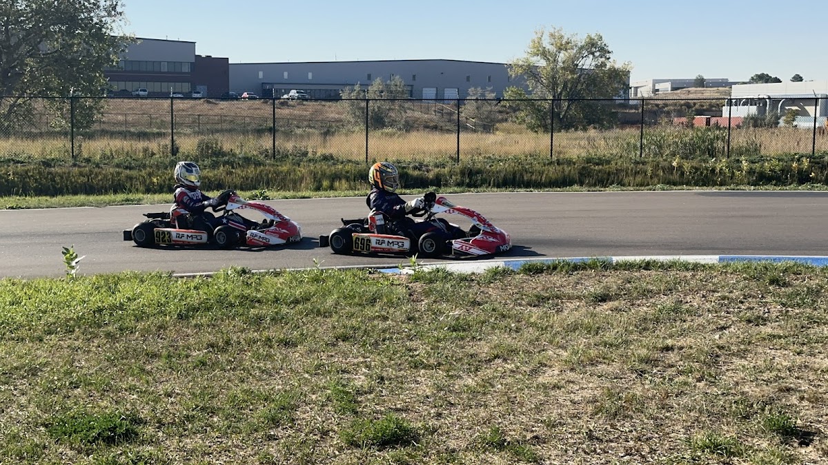 Go-karts racing on the outdoor circuit at Colorado Karting Circuit near Denver